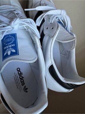 adidas White Leather Sneakers with Black Heel and Blue Tongue Logo